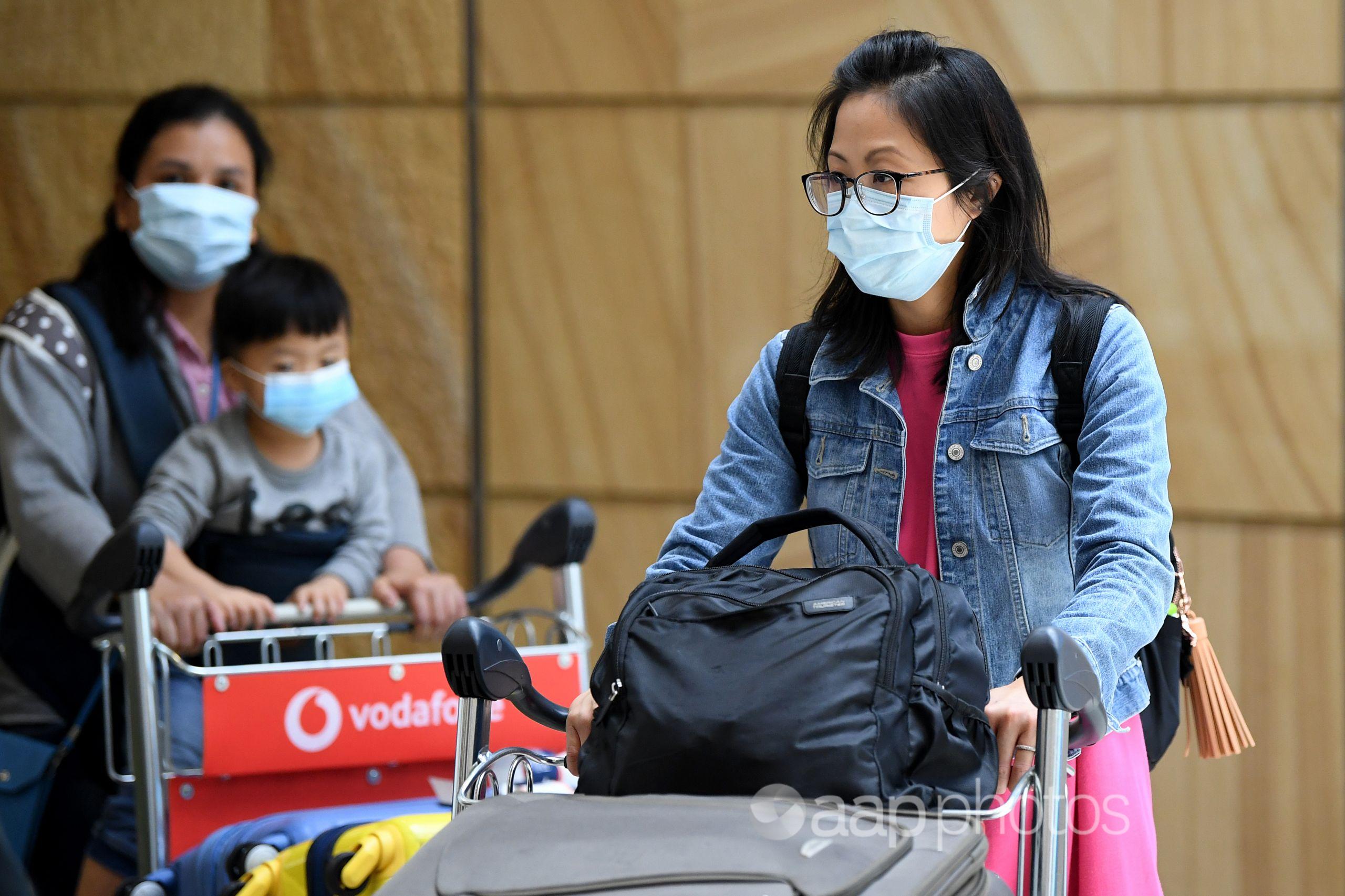 Passengers arrive at Sydney Airport