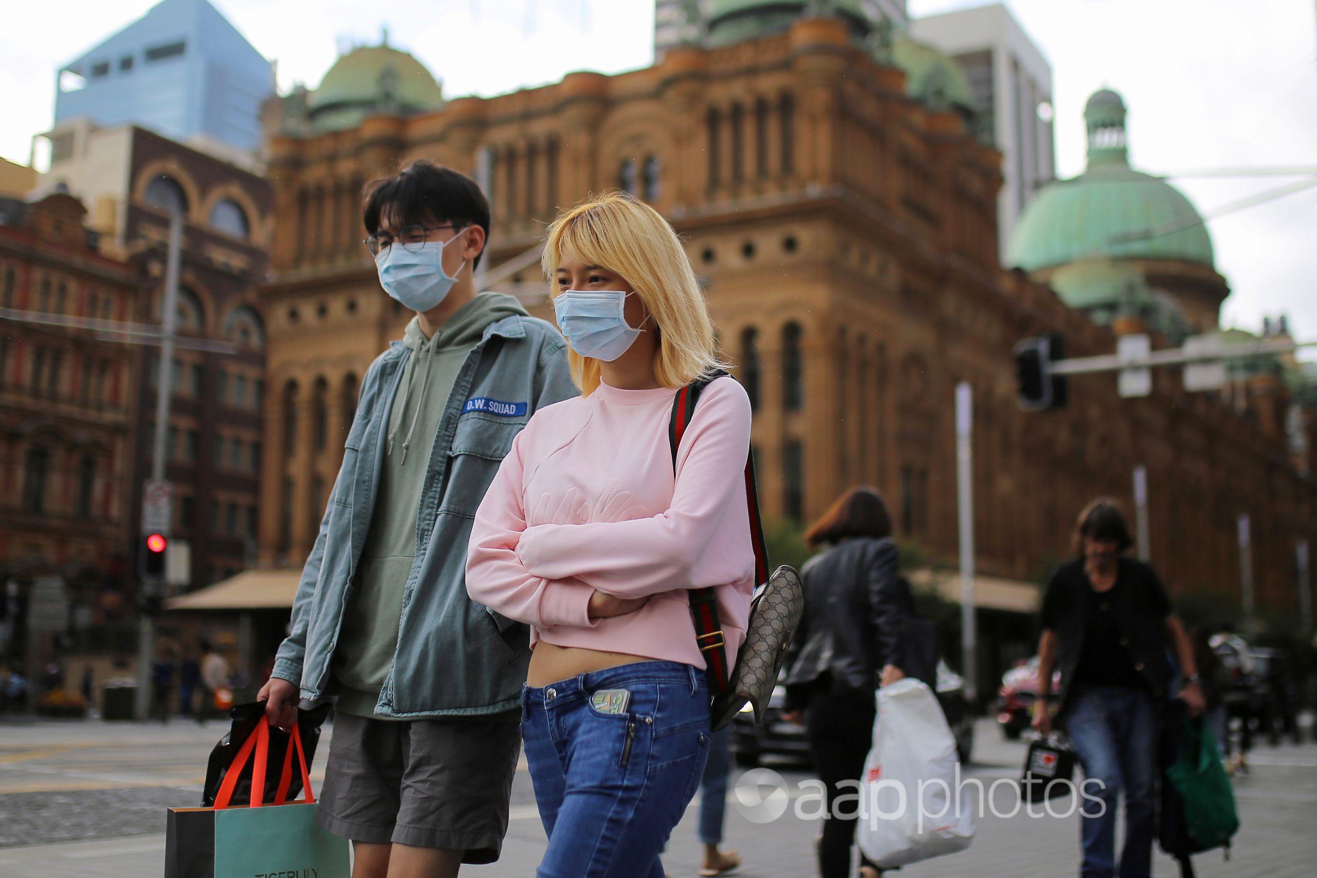 People wearing face masks in Sydney's CBD.