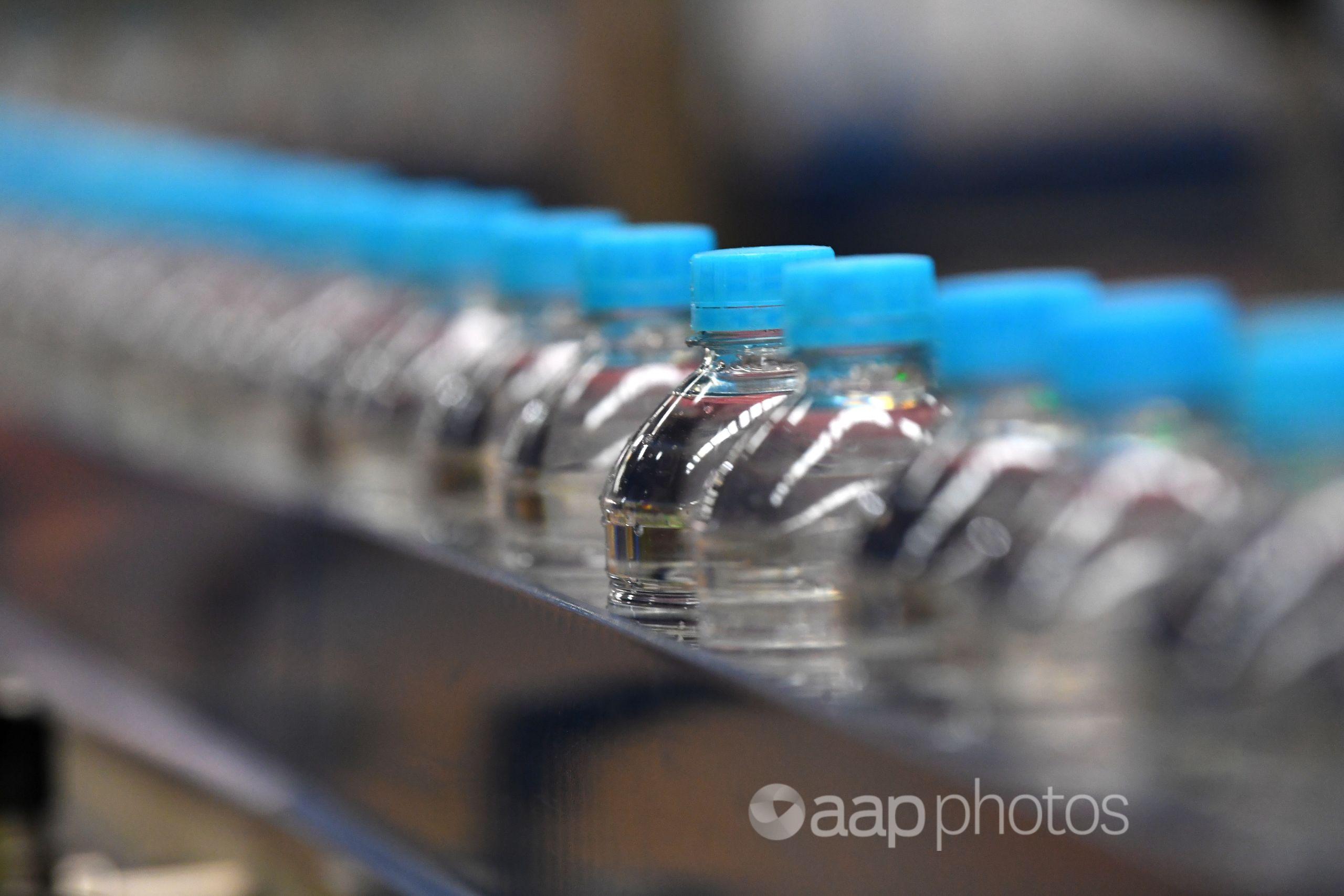 Bottles of water on a production line.