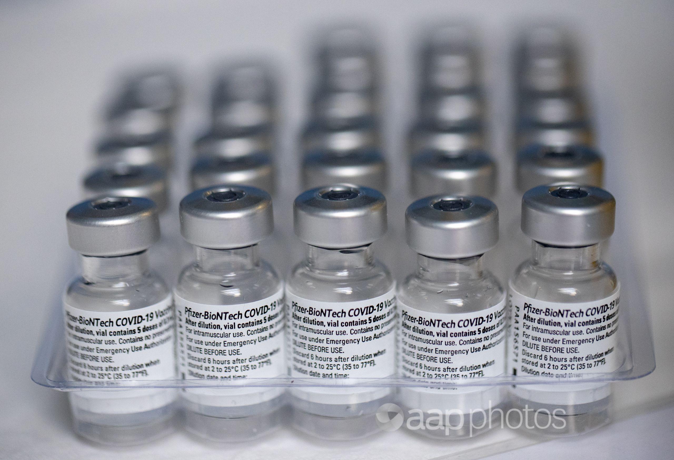 Pfizer COVID-19 vaccine vials.