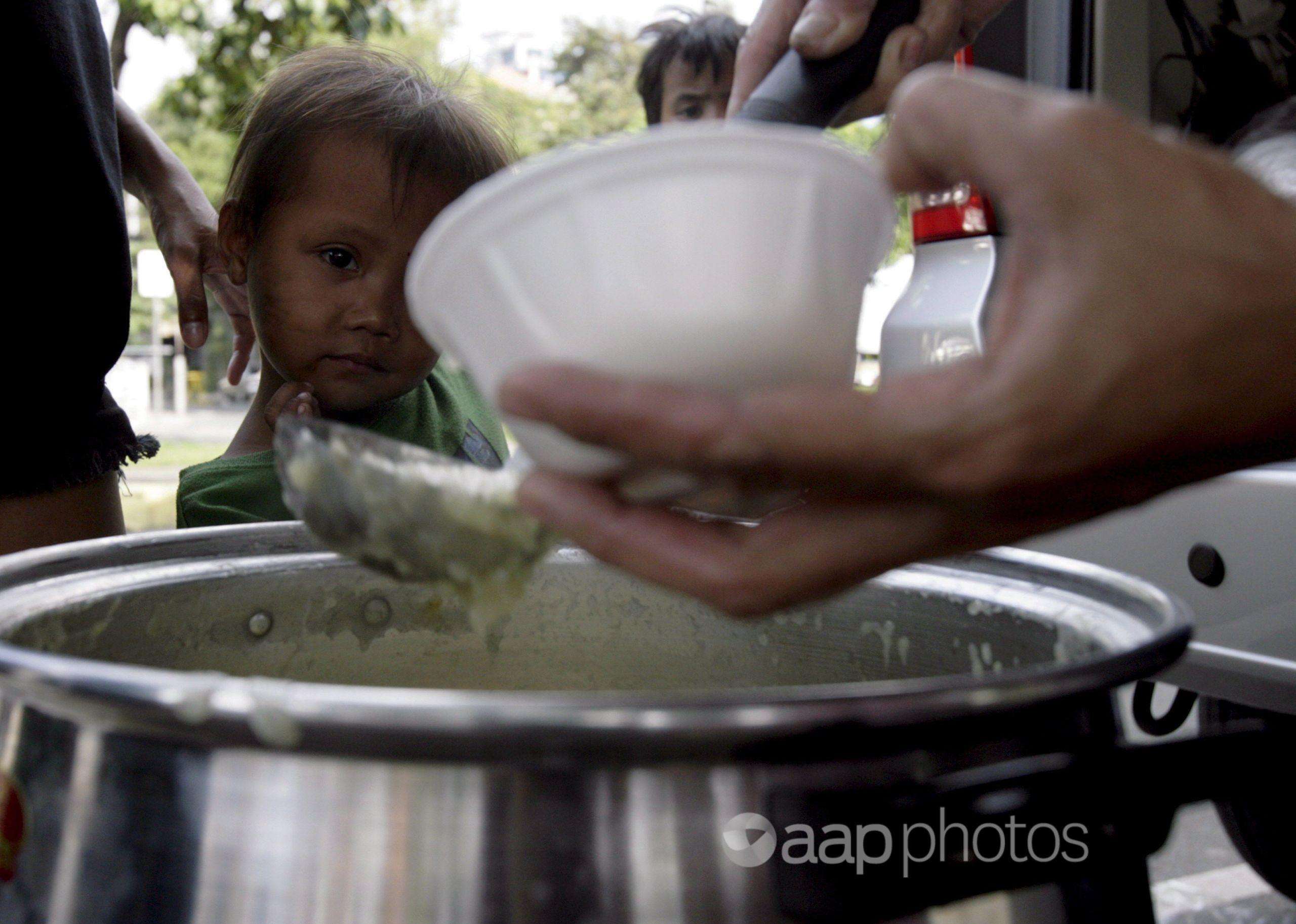 A child receives free porridge