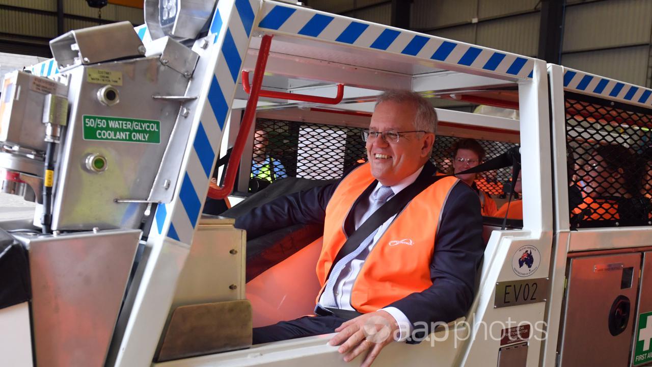 Prime Minister Scott Morrison in an electric vehicle.