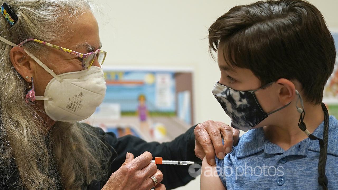 A doctor vaccinates a boy in the US (file image)