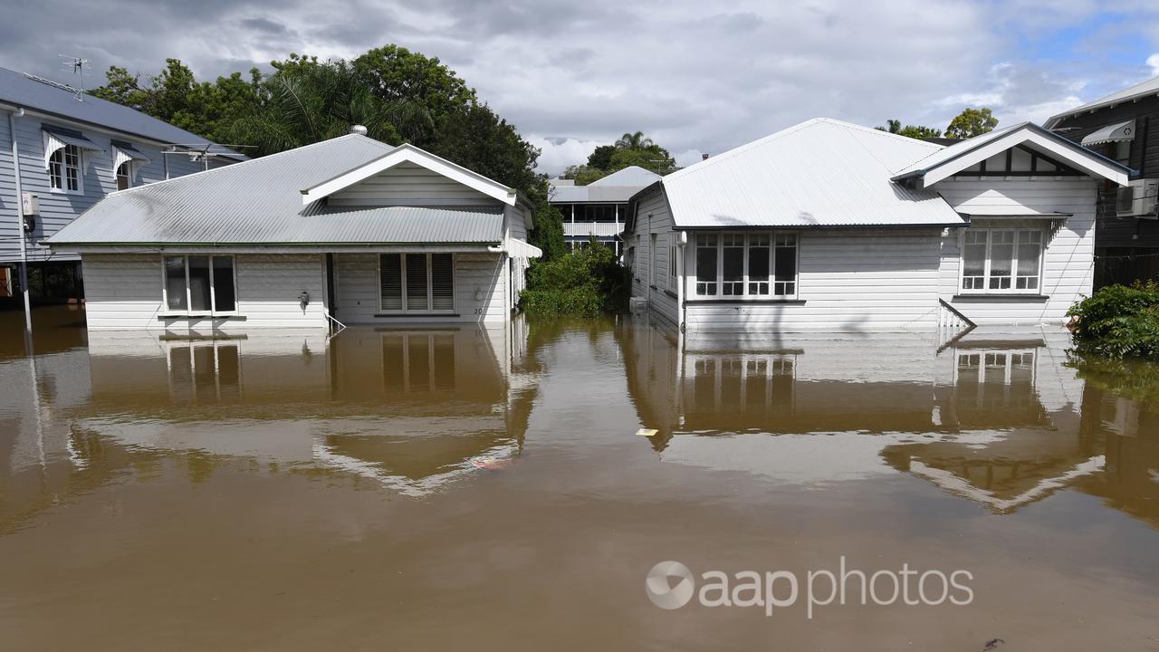 Houses engulfed by floodwaters in a Brisbane suburb.