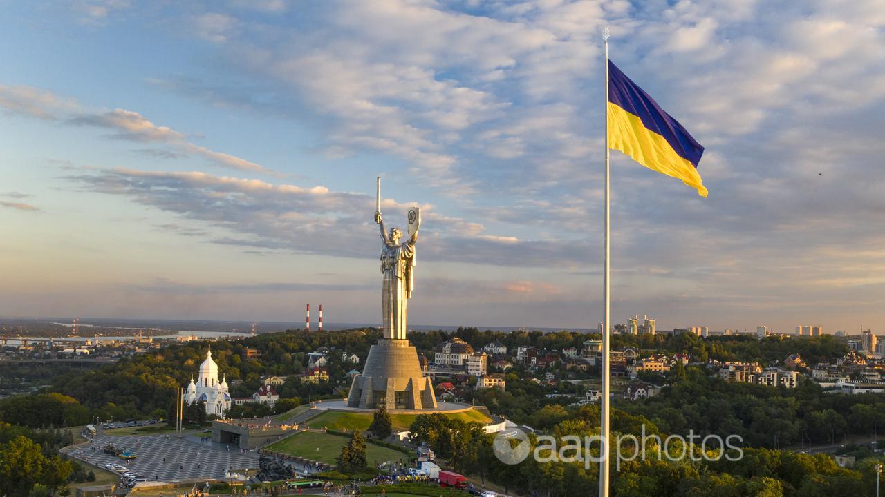 Ukraine's flag flies above the nation's capital Kyiv (file image)