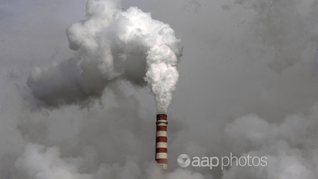 Smoke billows from a coal-fired power plant.