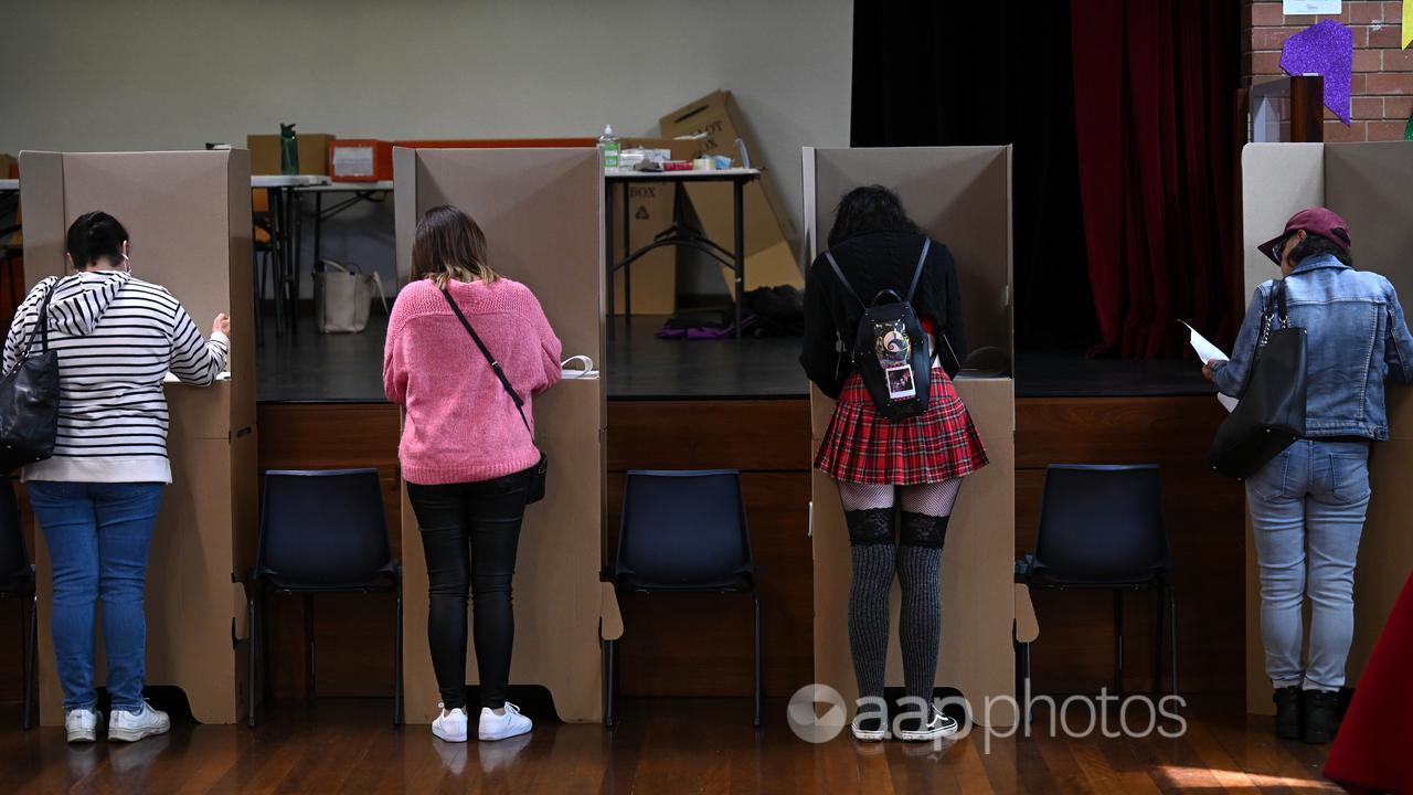 Voting at the Strathfield North Public School polling booth.