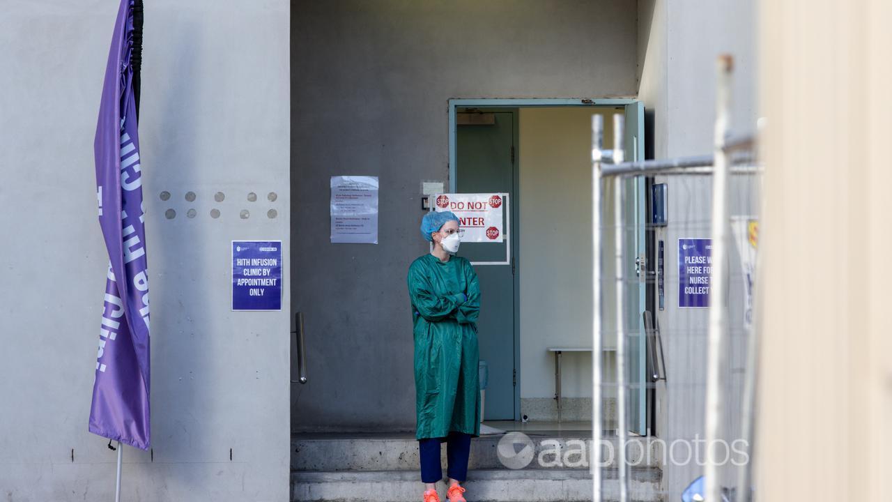 A nurse is seen outside of a hospital in Melbourne