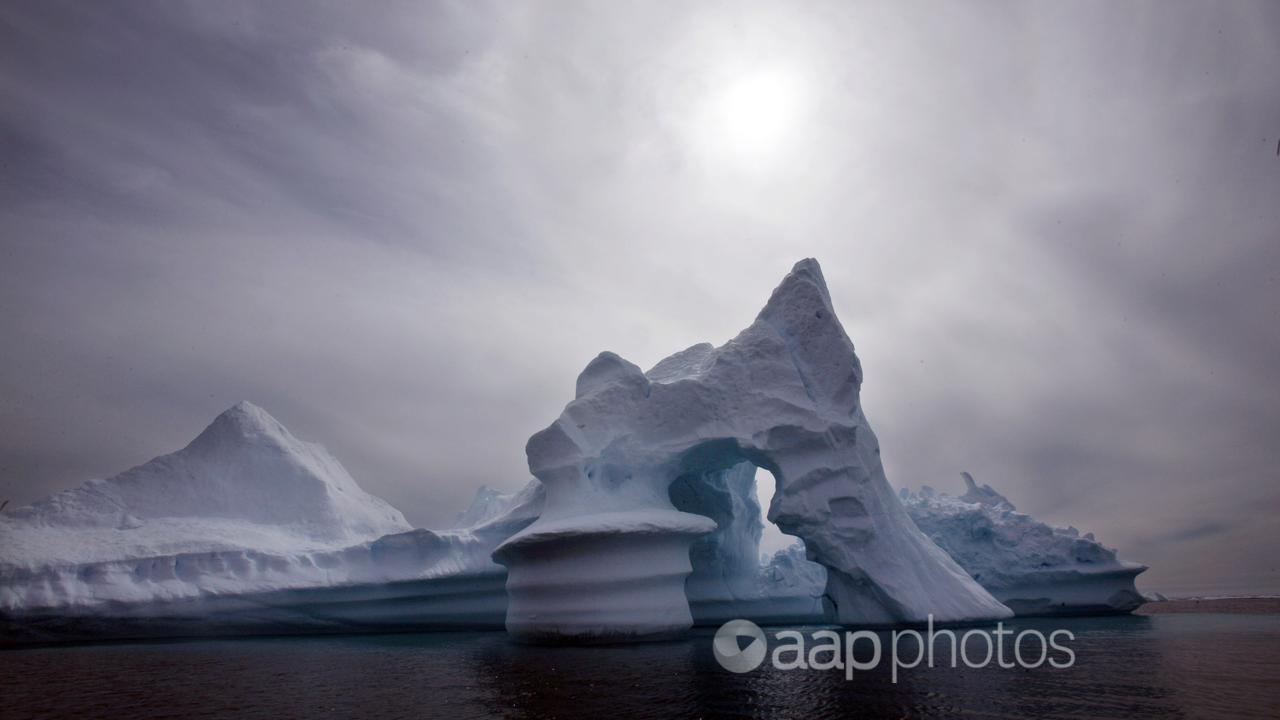 An iceberg melts off Ammassalik Island in eastern Greenland.