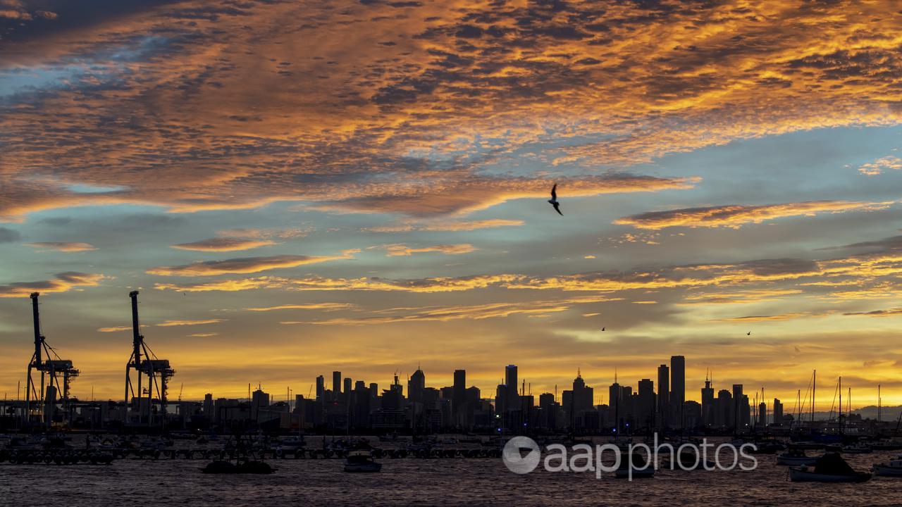 The Melbourne skyline at sunrise.