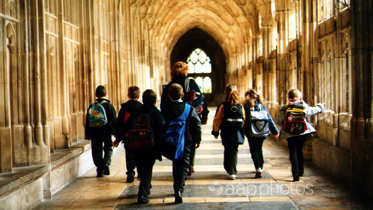 Children tour Gloucester Cathedral in England (file image)