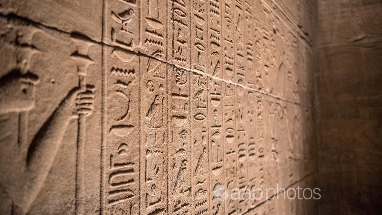 Hieroglyphs in the chambers of Abu Simbel temple in southern Egypt