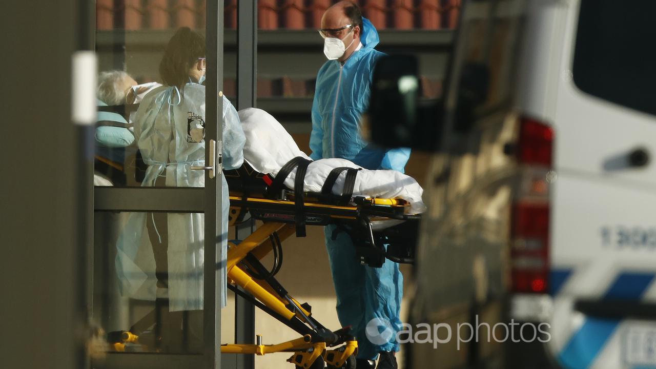 A patient is removed from a care facility