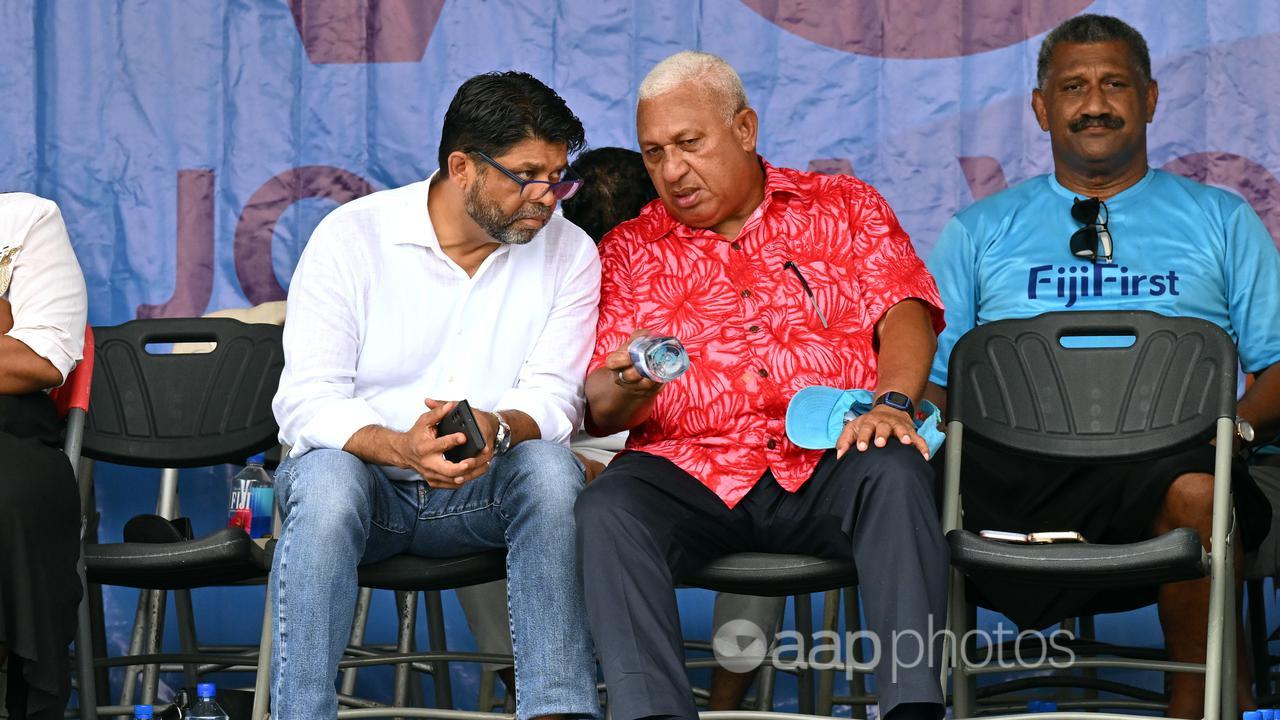 Aiyaz Sayed-Khaiyum (white shirt) with PM Frank Bainimarama.
