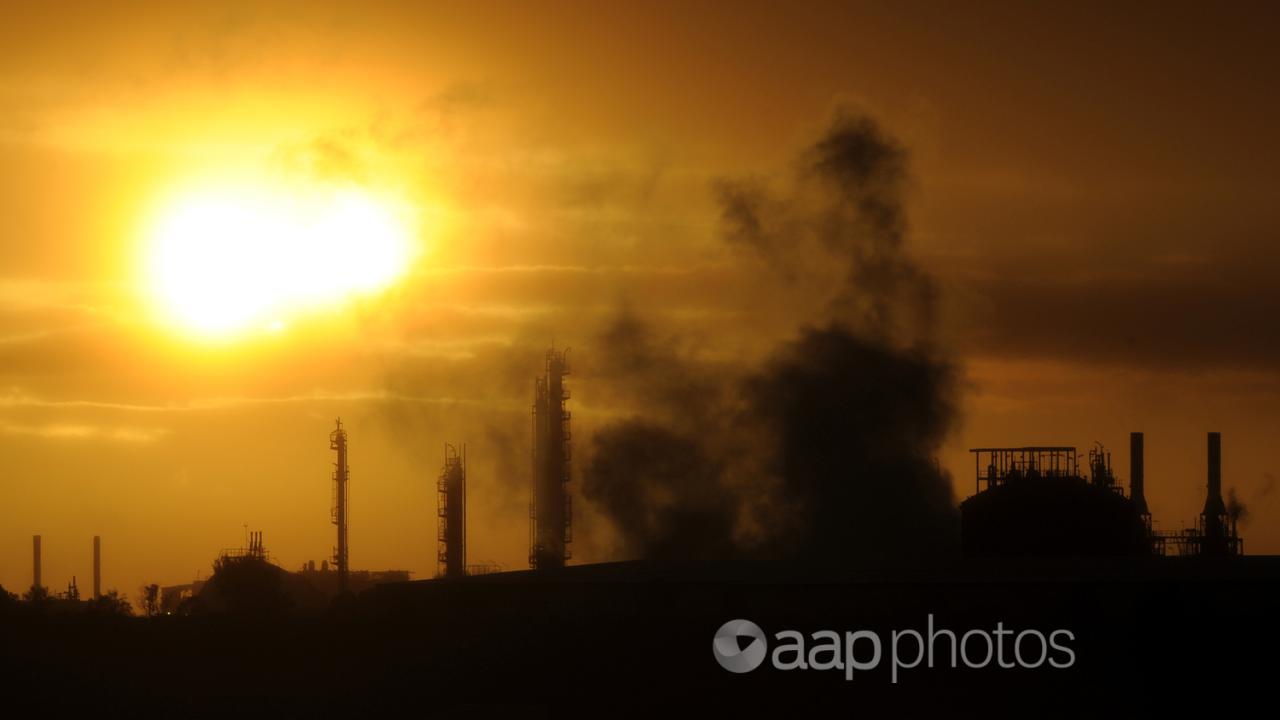 Emissions rise from an industrial plant in Melbourne