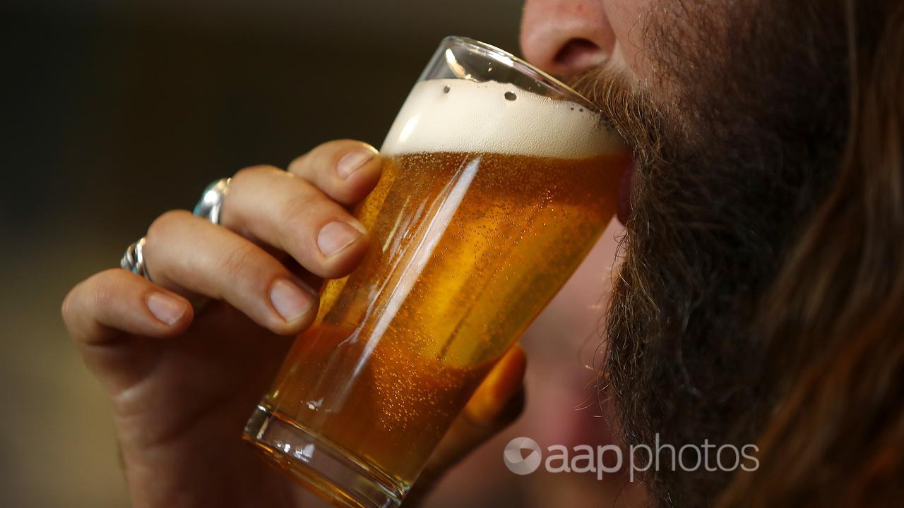 A man drinks a beer (file image)