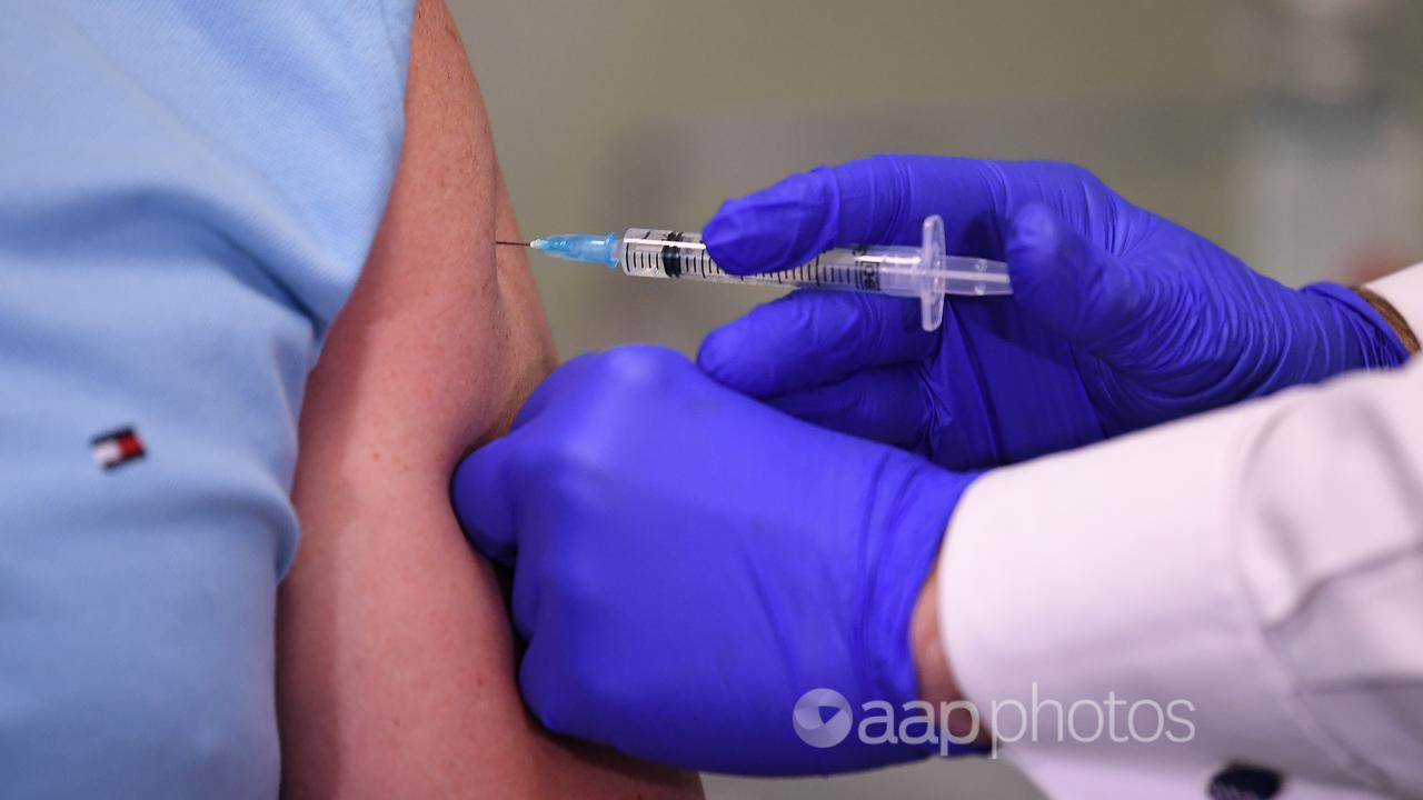 A person gets a COVID-19 vaccination (file image)