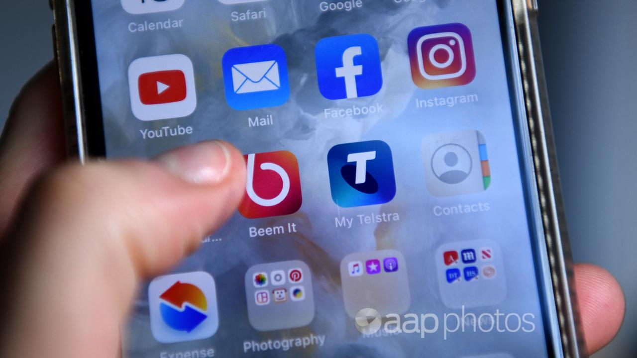 Social media apps displayed on a phone screen (file image)