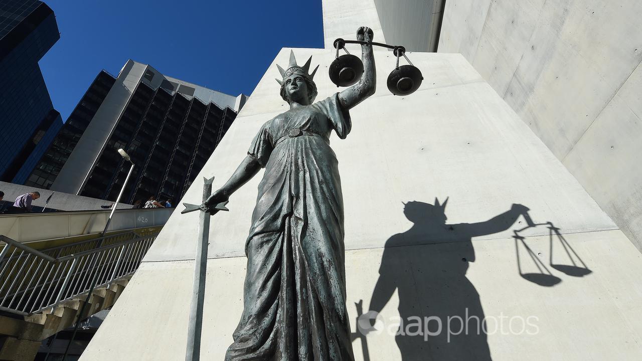 Themis, the goddess of Justice, outside the Supreme Court in Brisbane