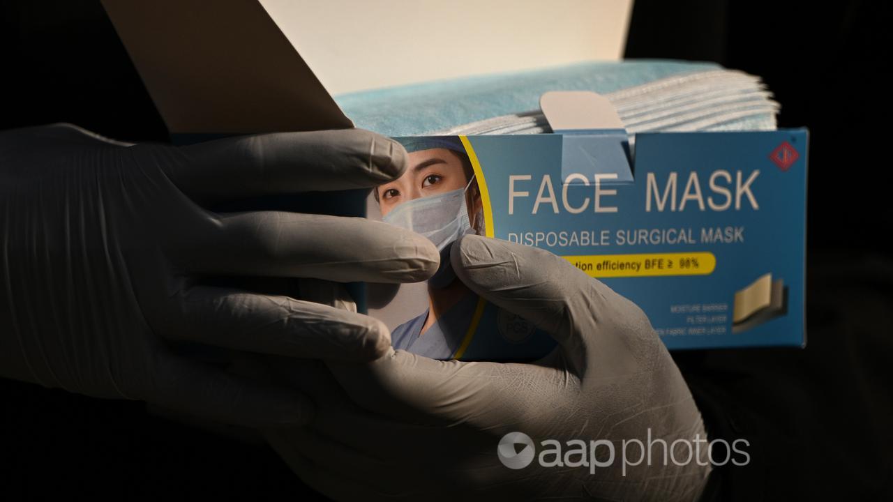A box of surgical face masks (file image)