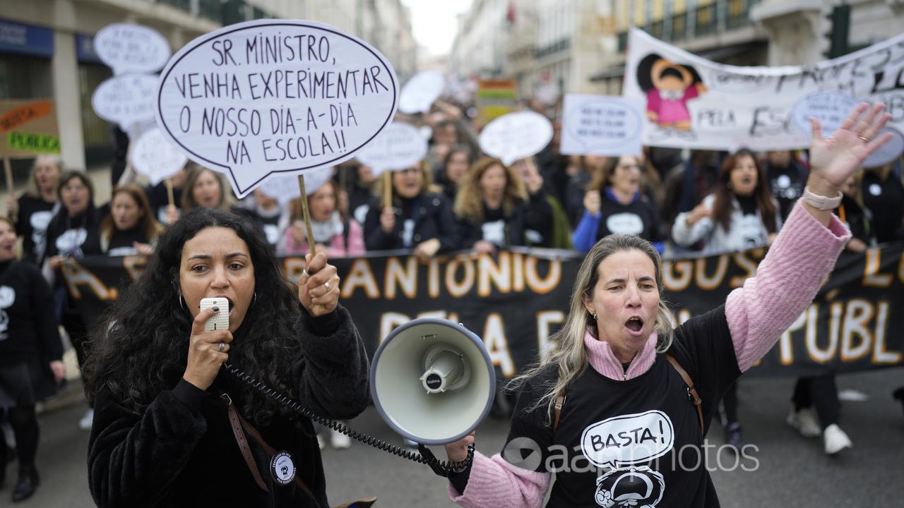 Protesters march through downtown Lisbon