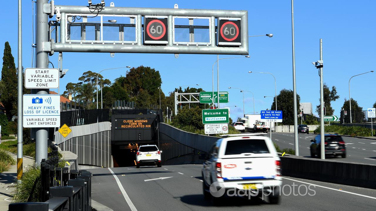 Vehicles on the WestConnex M4 tunnel entrance at Haberfield in Sydney.