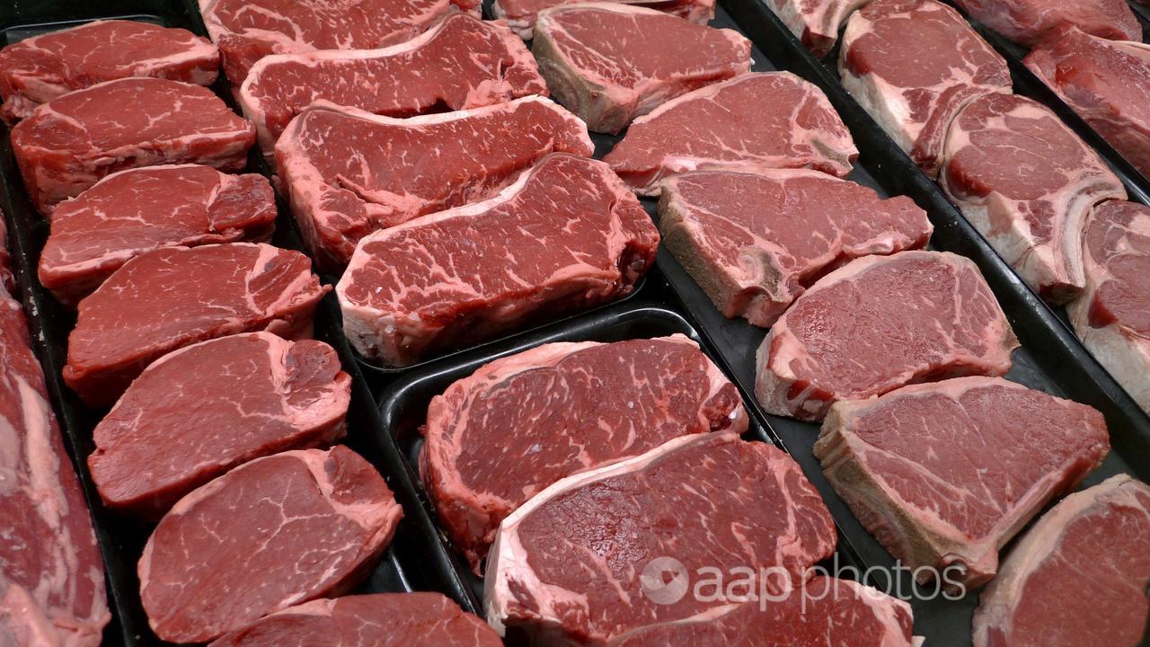 Steaks and other beef products are displayed for sale (file image)