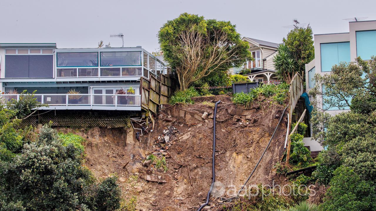 A landslip near a house in Auckland caused by Cyclone Gabrielle