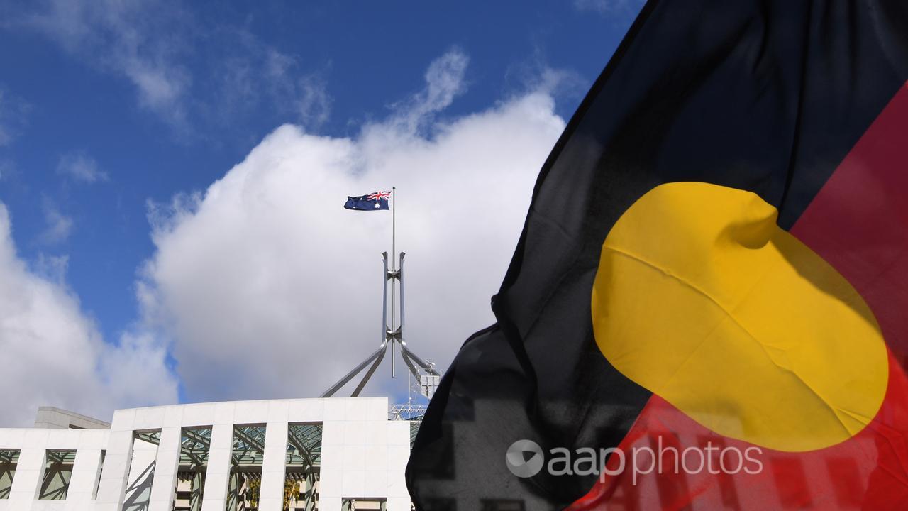 The Aboriginal flag in front of parliament.