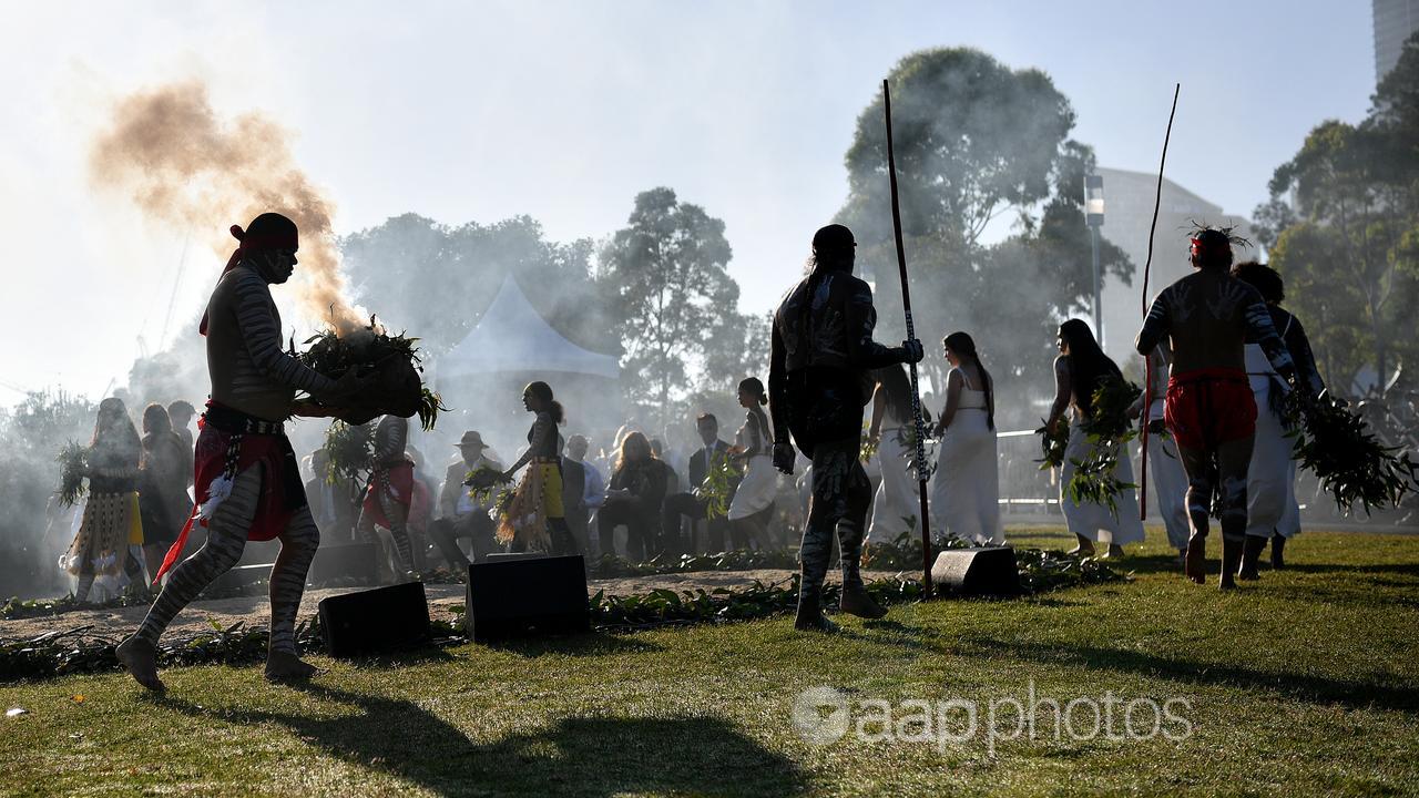 Koomurri dancers perform a smoking ceremony in Sydney (file image)