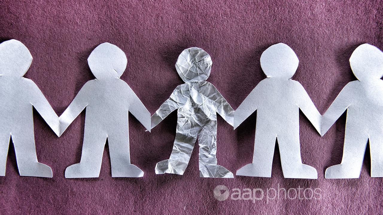 Paper cut outs of people (file image)