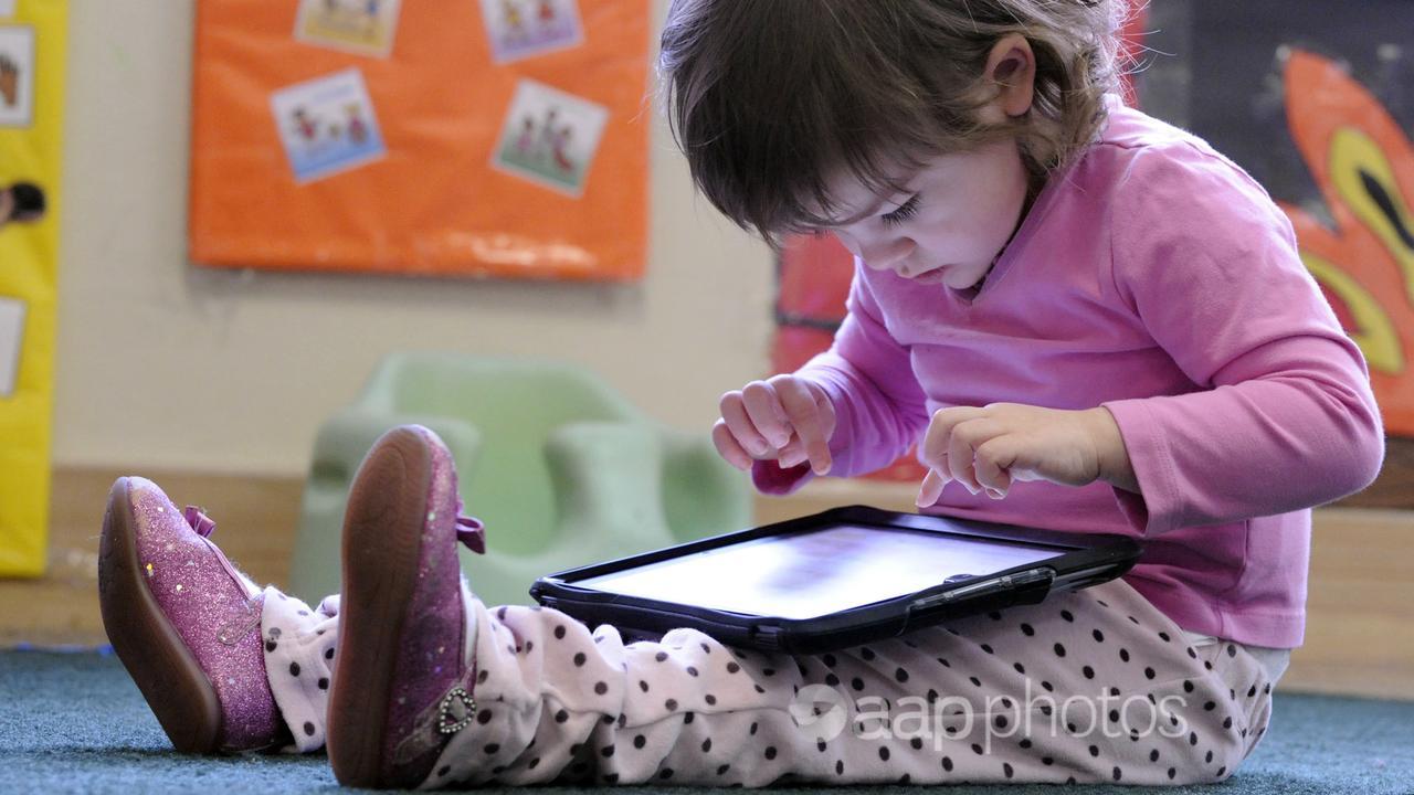 A child using a tablet computer (file image)