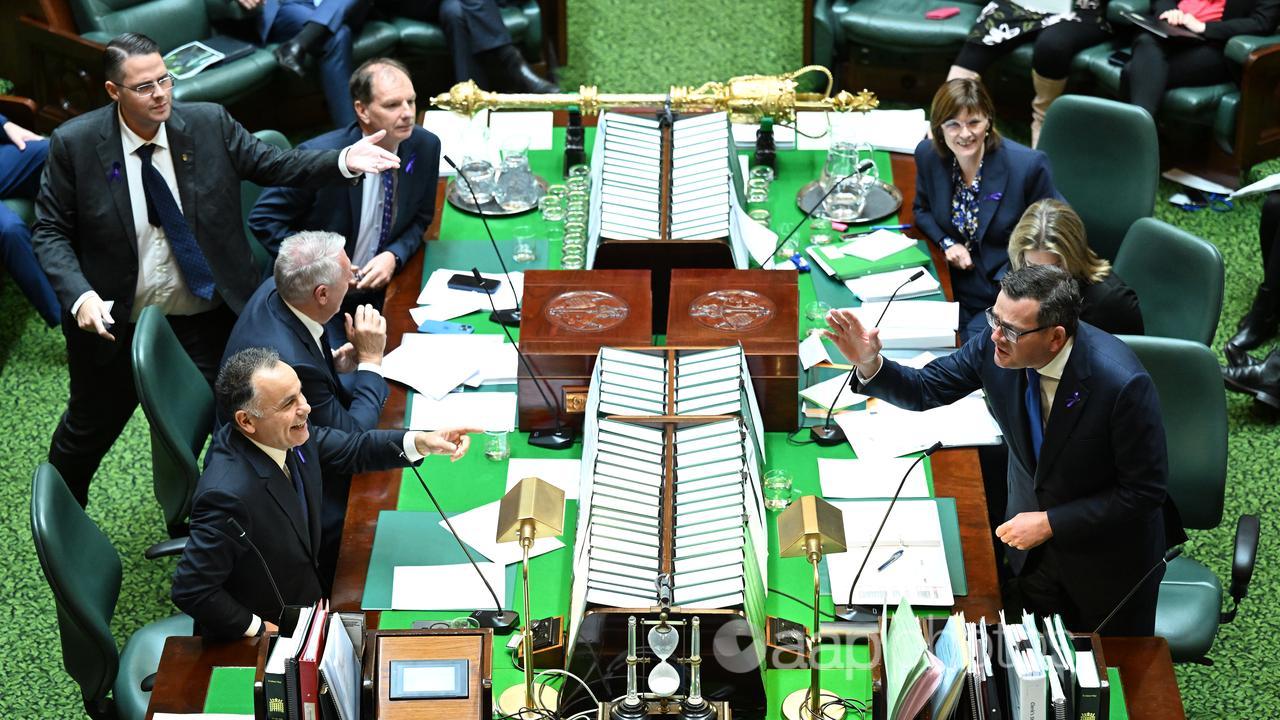 Daniel Andrews (right) speaks during question time (file image)