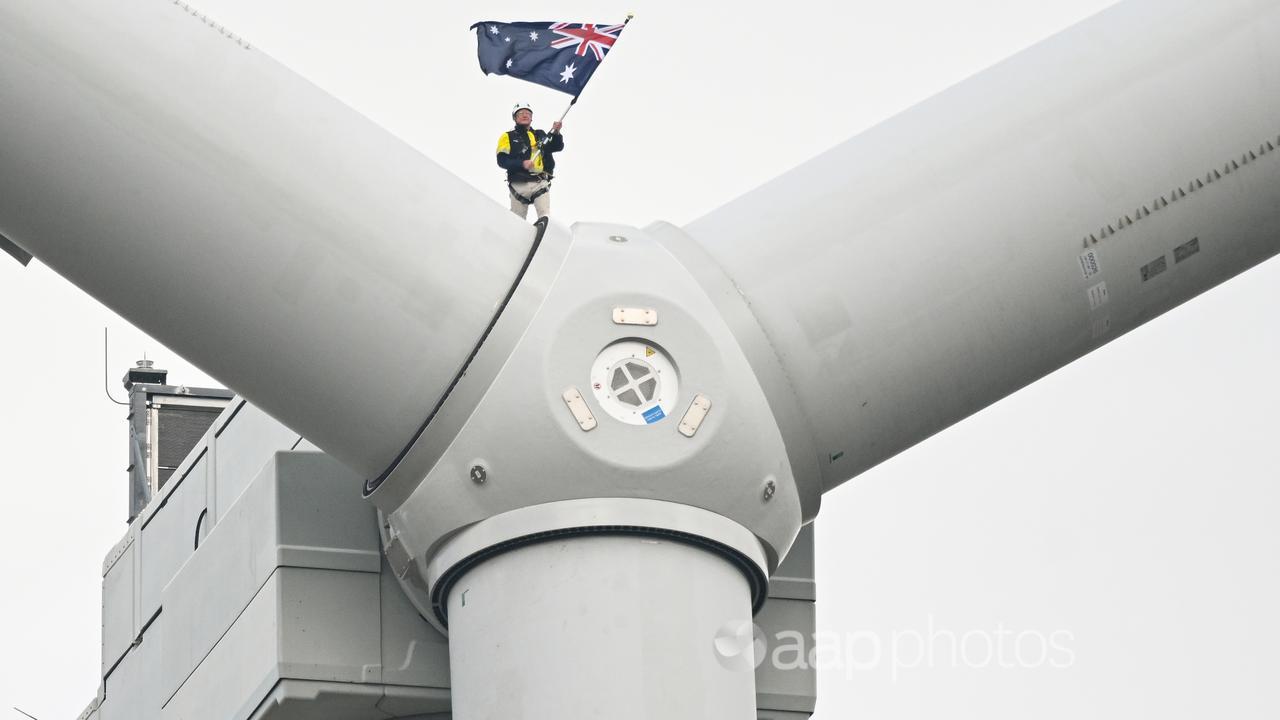 An Australian flag waved on top of a wind turbine (file image)