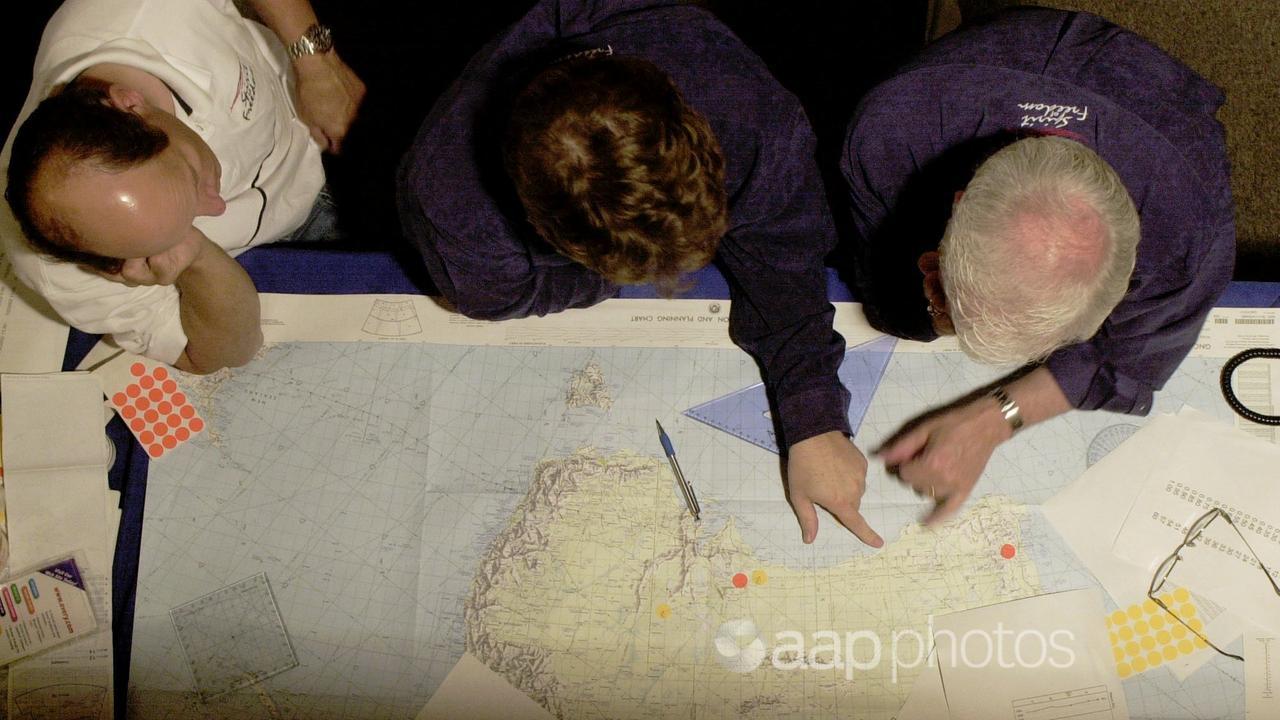 Aviators study a map of Australia (file image)