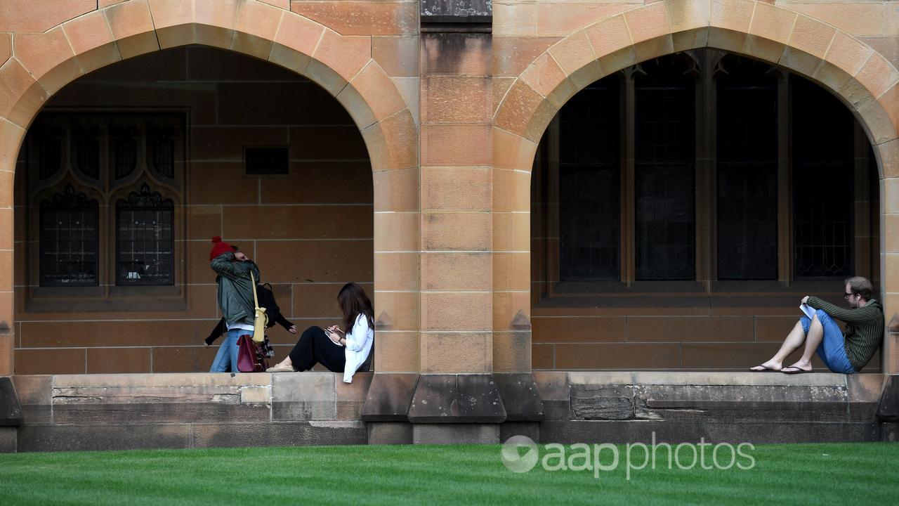 Student in the Quadrangle at the University of Sydney.