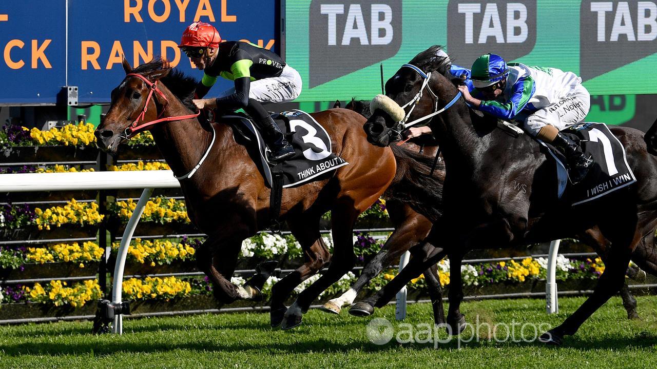 Sam Clipperton rides Think About It (3) to victory at The Everest.