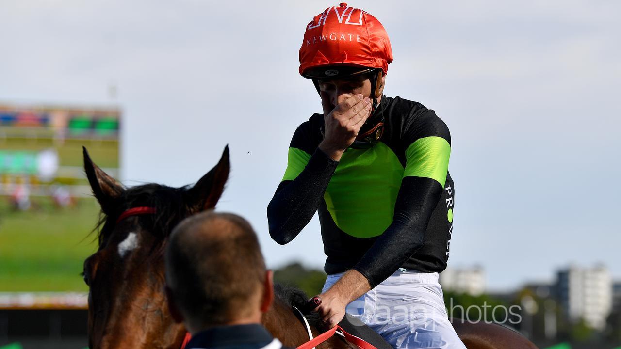 Sam Clipperton reacts after winning The Everest.