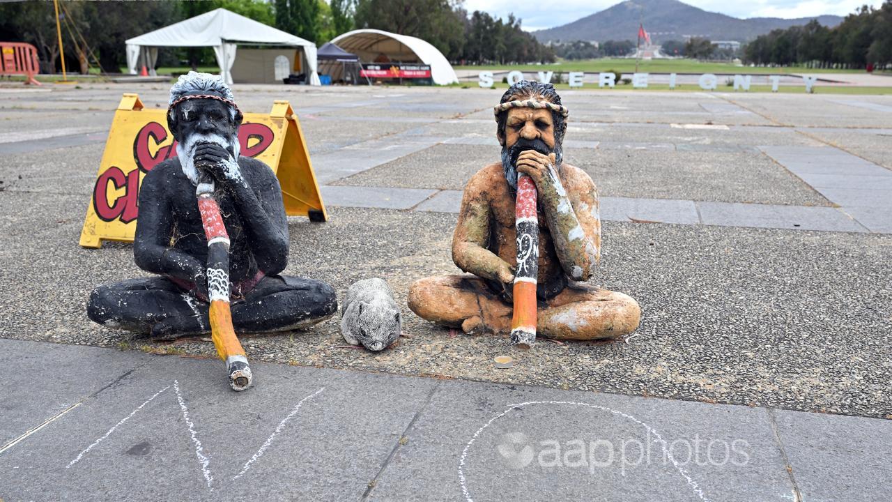 NO” is chalked at the Aboriginal Tent Embassy in Canberra