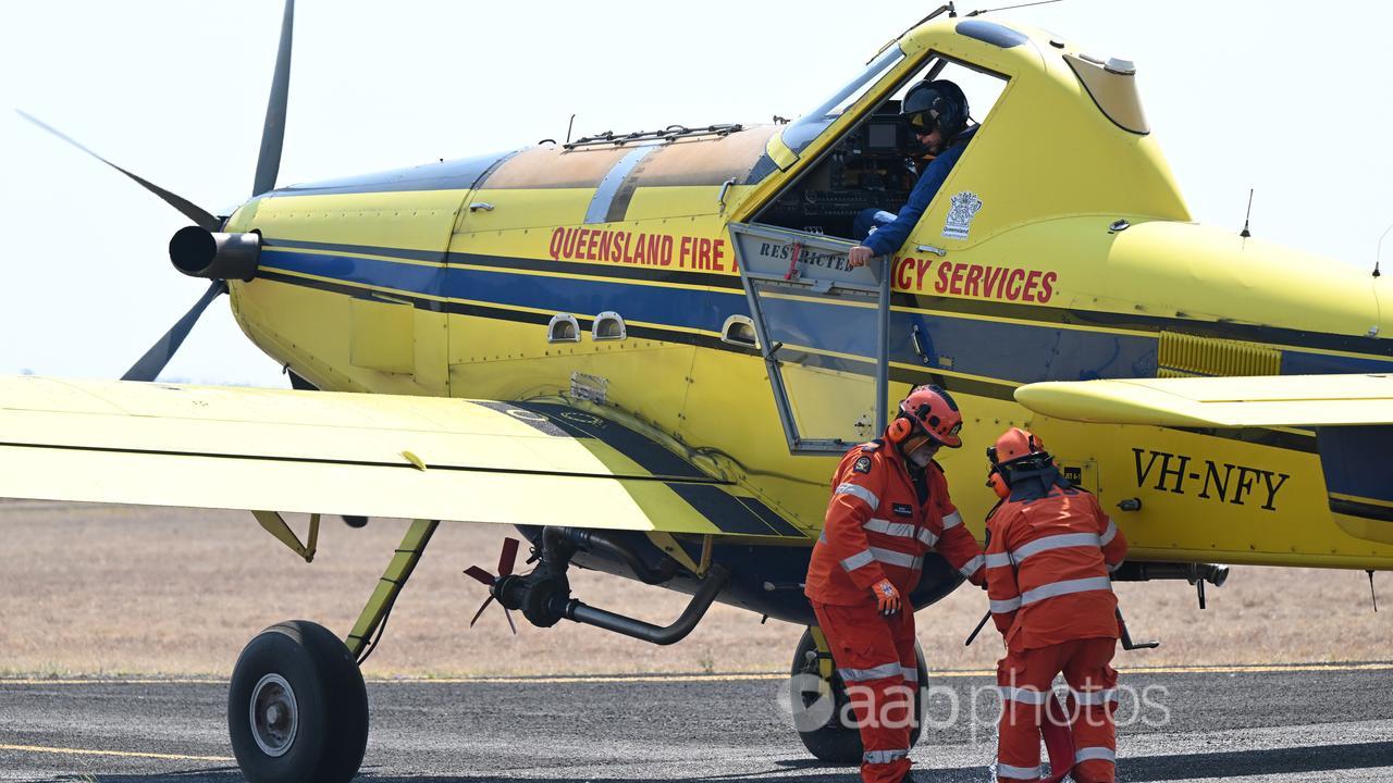 Queensland firefighters and water-bombing aircraft.