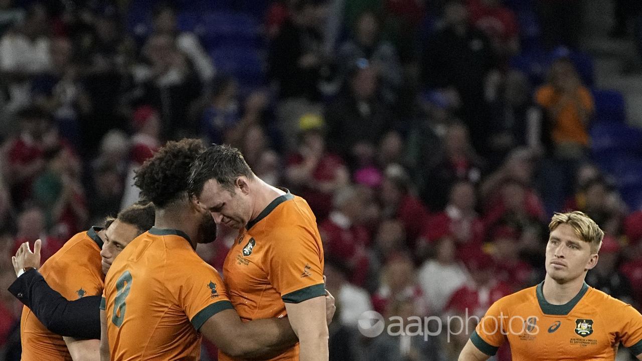 Wallaby players looking despondent after their loss to Wales.