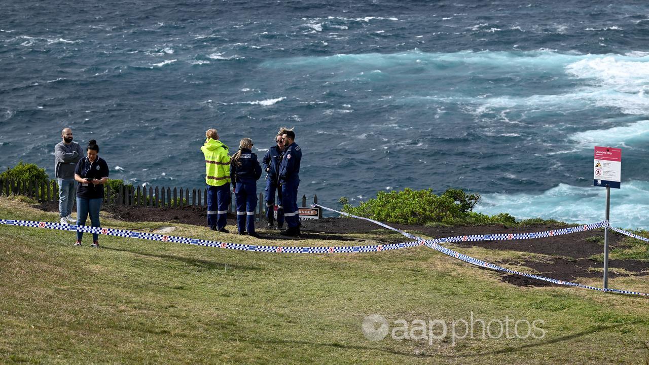 Police setting up a crime scene at the clifftop Diamond Bay Reserve.