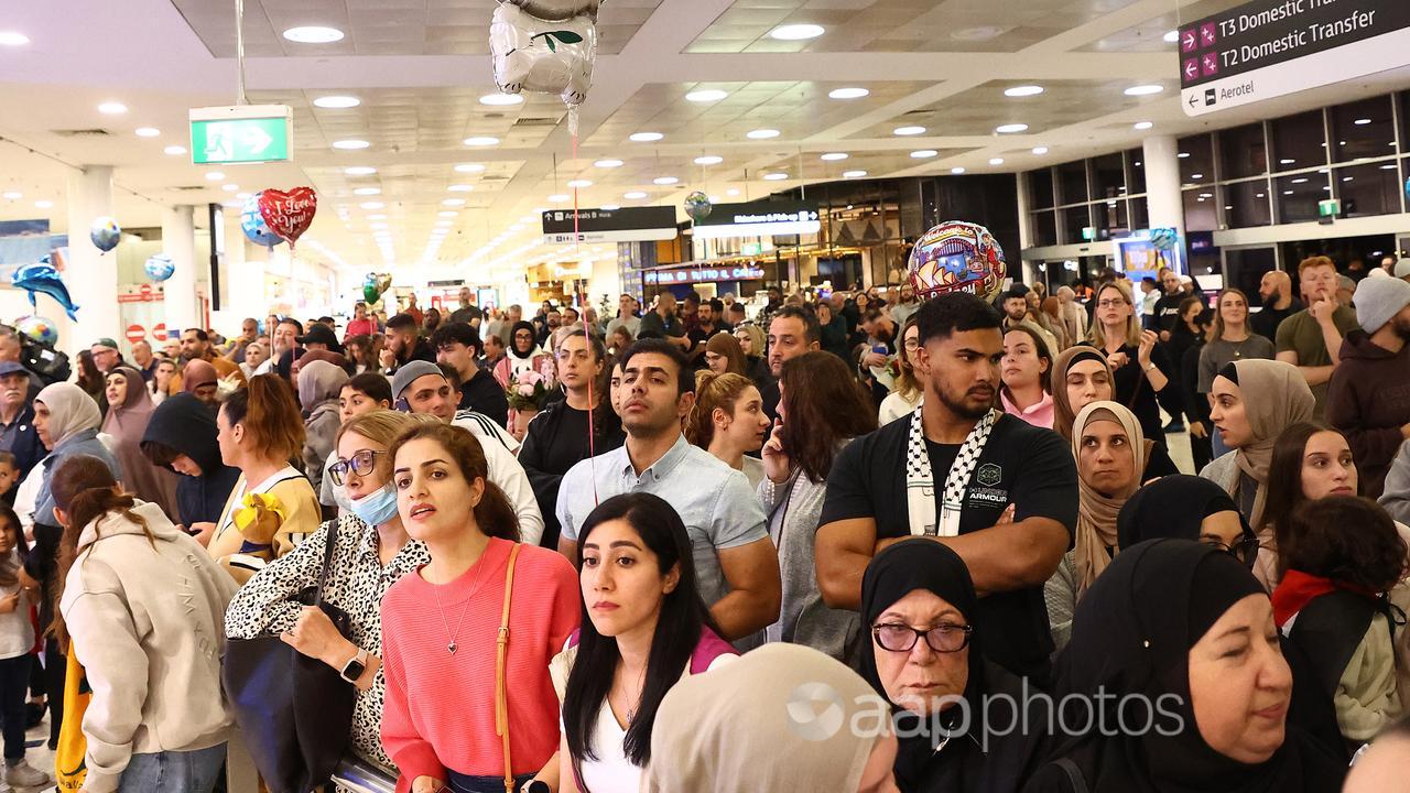 Families and friends wait at Sydney International Airport