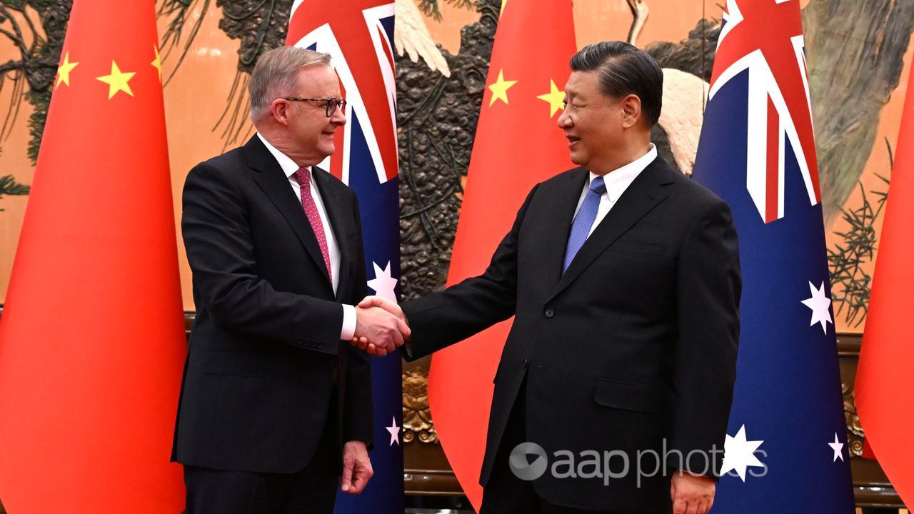 Anthony Albanese shakes hands with Xi Jinping
