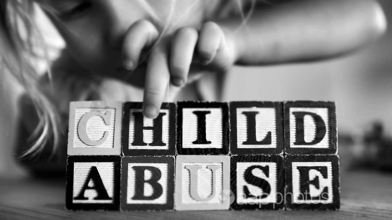 A child plays with blocks (file image)