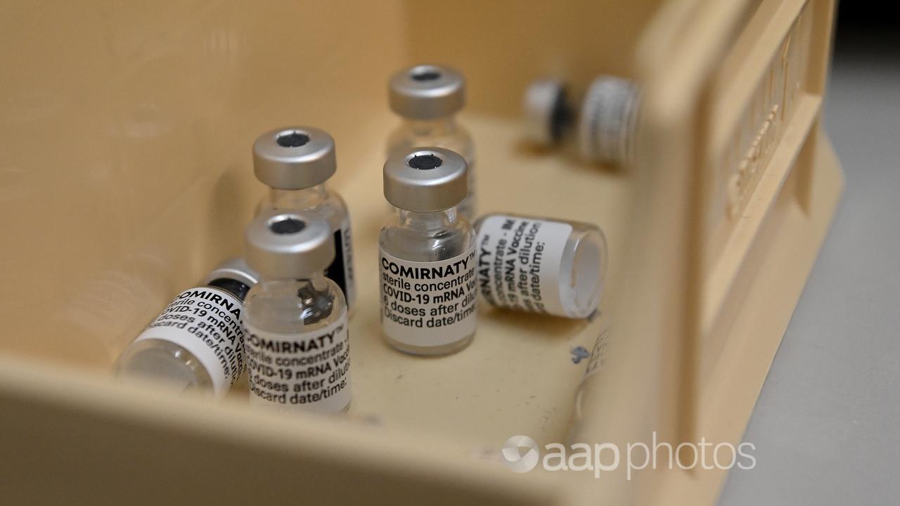 Vials of the Pfizer COVID-19 vaccination in a plastic container