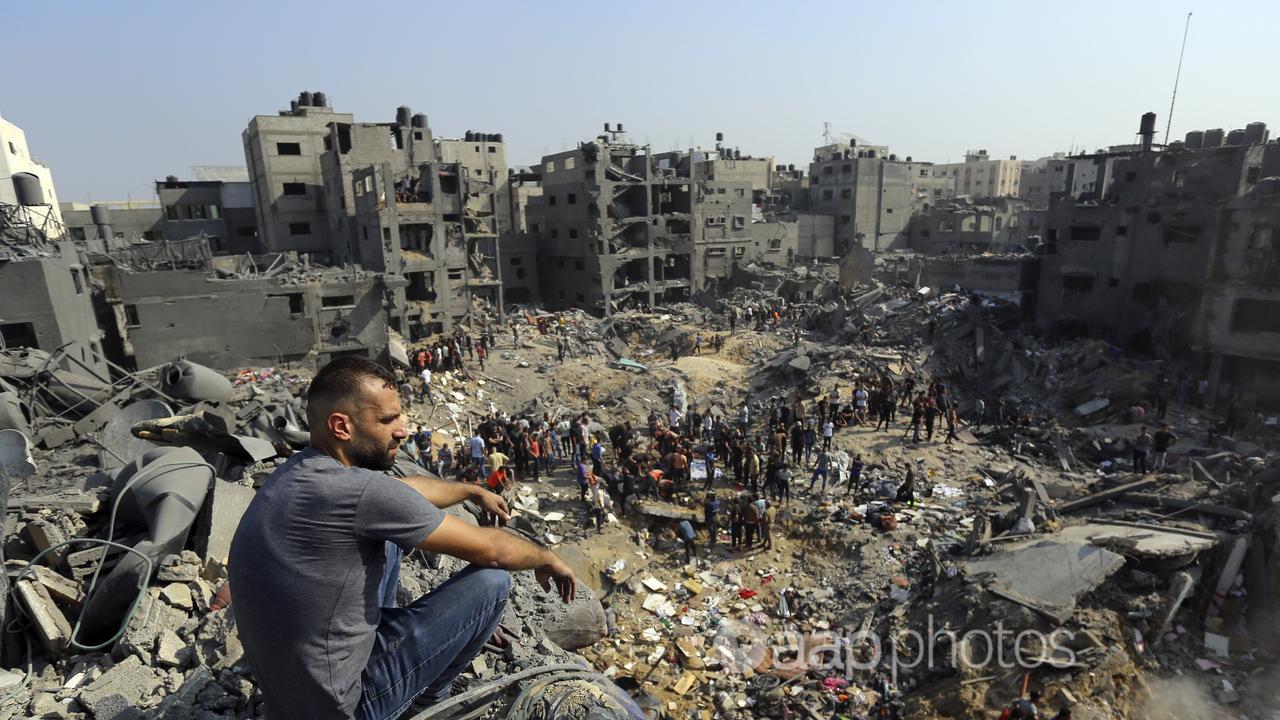 A man surveys the destruction at the Jabaliya refugee camp