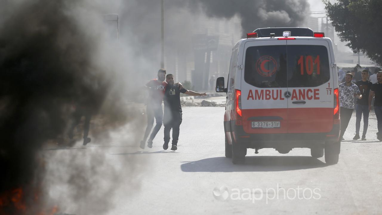 An ambulance during clashes with Israeli forces in the West Bank.