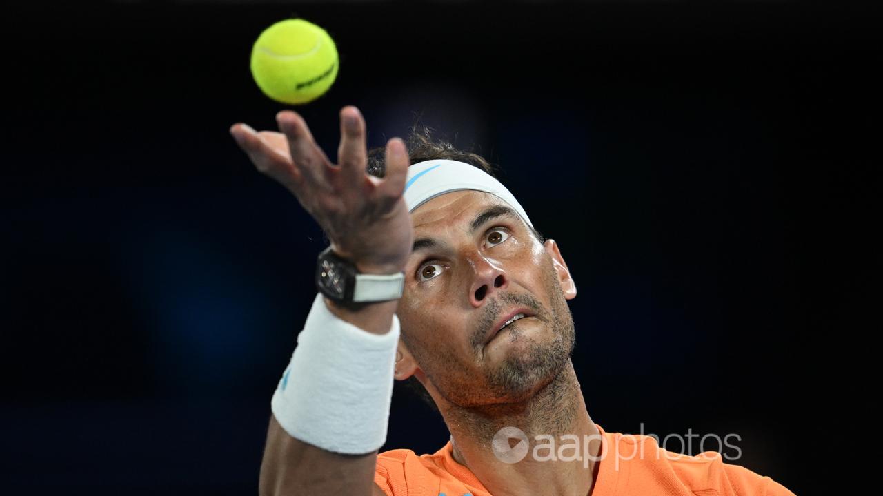 Rafa Nadal serves at the 2023 Australian Open.