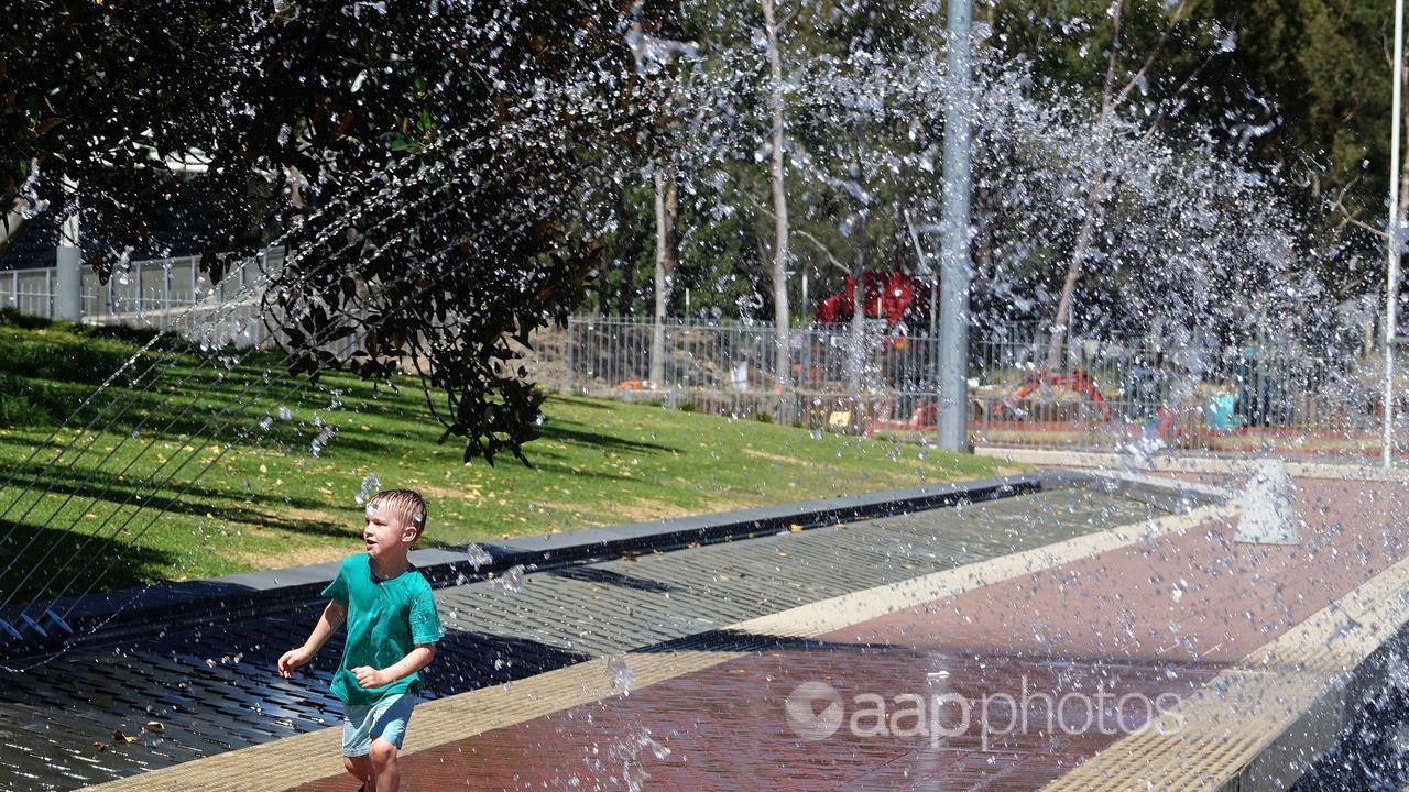 A child in a water feature in Sydney's west (file image)